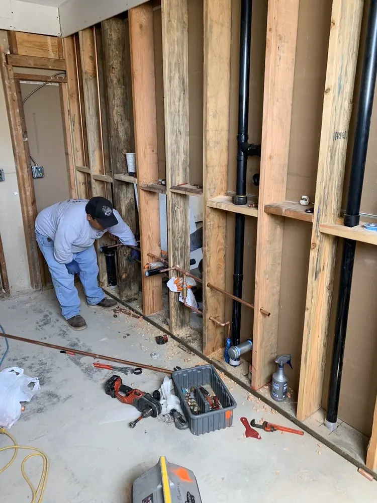Commercial rough-in plumbing for Water Heater Replacement in Independence Village